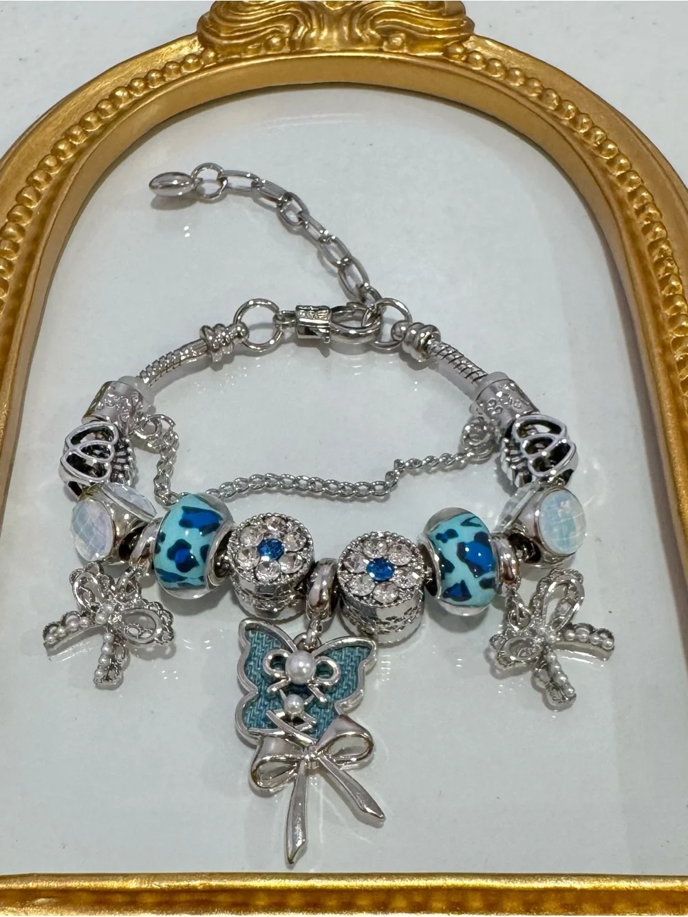 New Silver-Tone Blue Charm Bracelet with Butterfly & Bow Accents